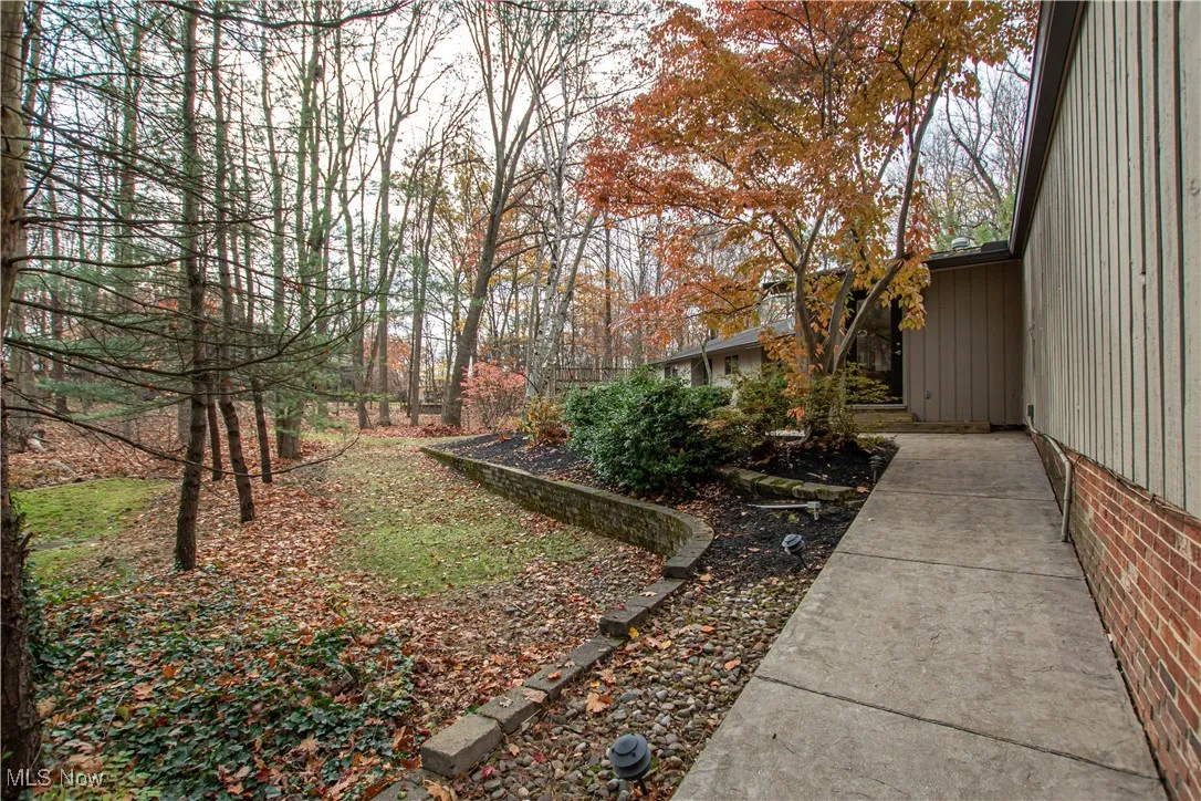 Sloped walk that can provide zero entry to family room door starting from side of garage. Perfect for (ADA people).
