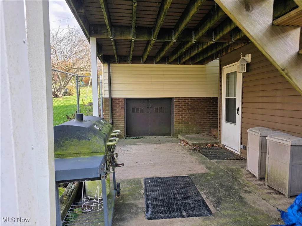 View of patio with area for grilling