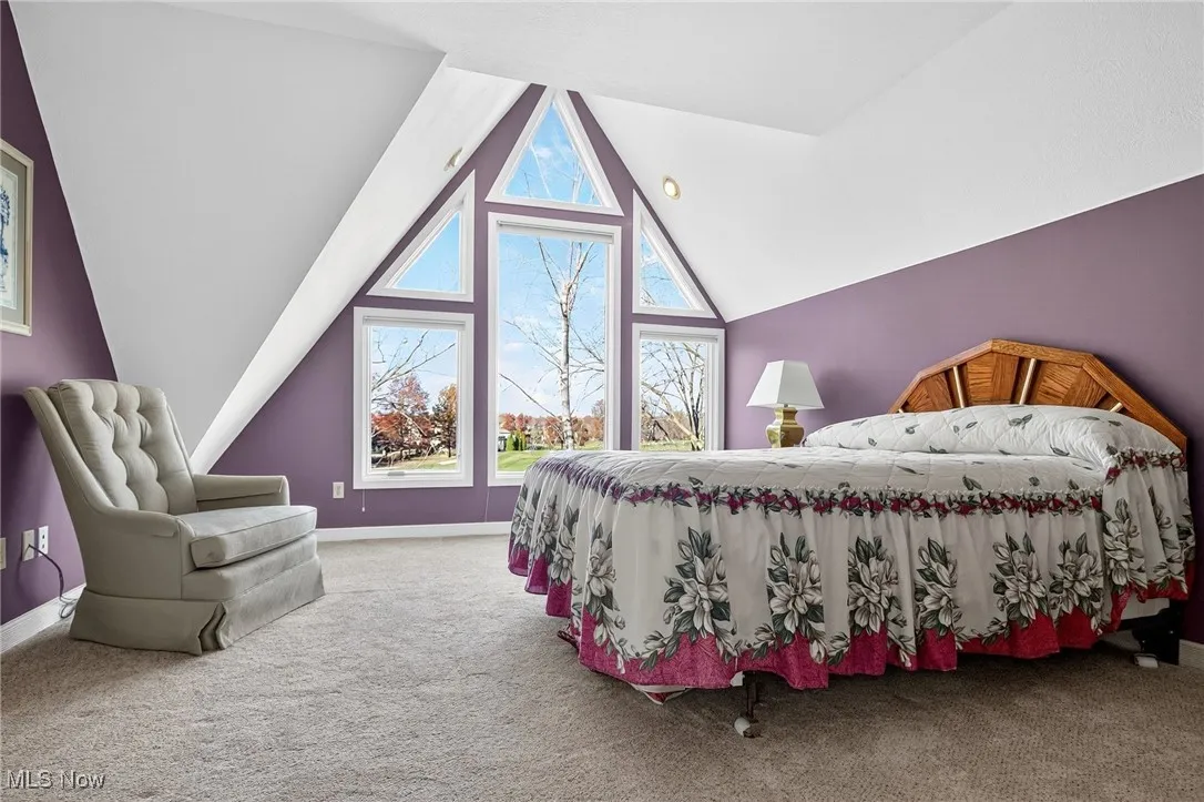 3rd Bedroom on 3rd floor with carpet and vaulted ceiling