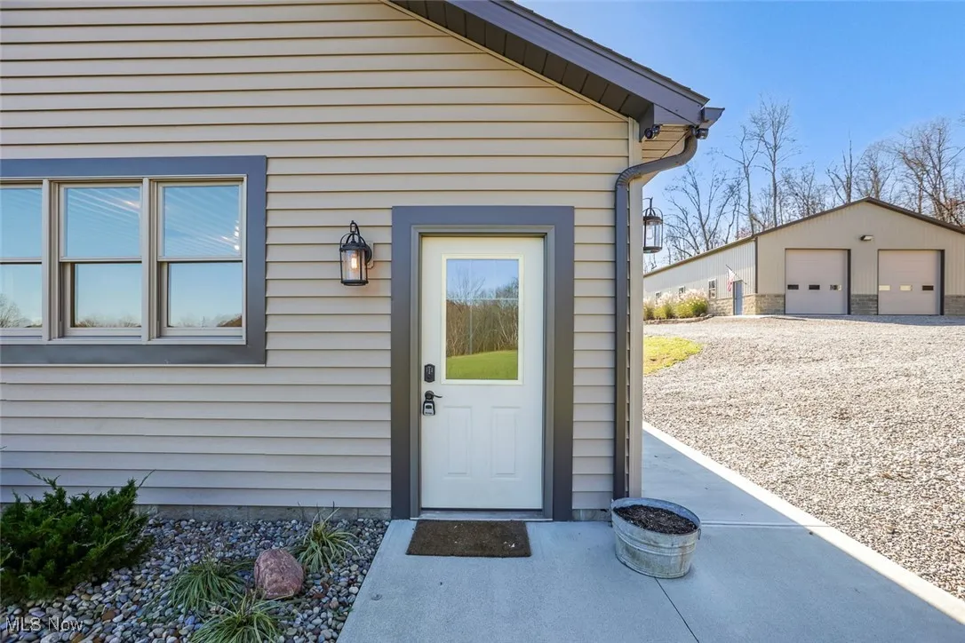 Property entrance with a garage