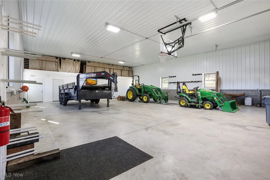 Garage featuring metal wall