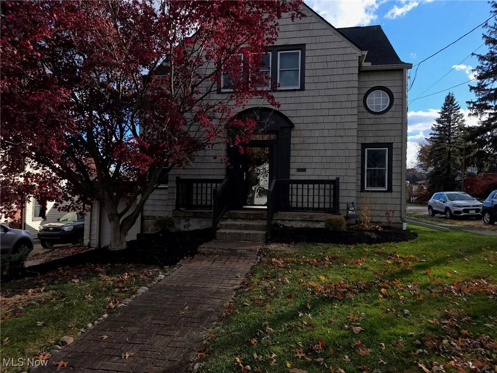 View of front of house with a front yard