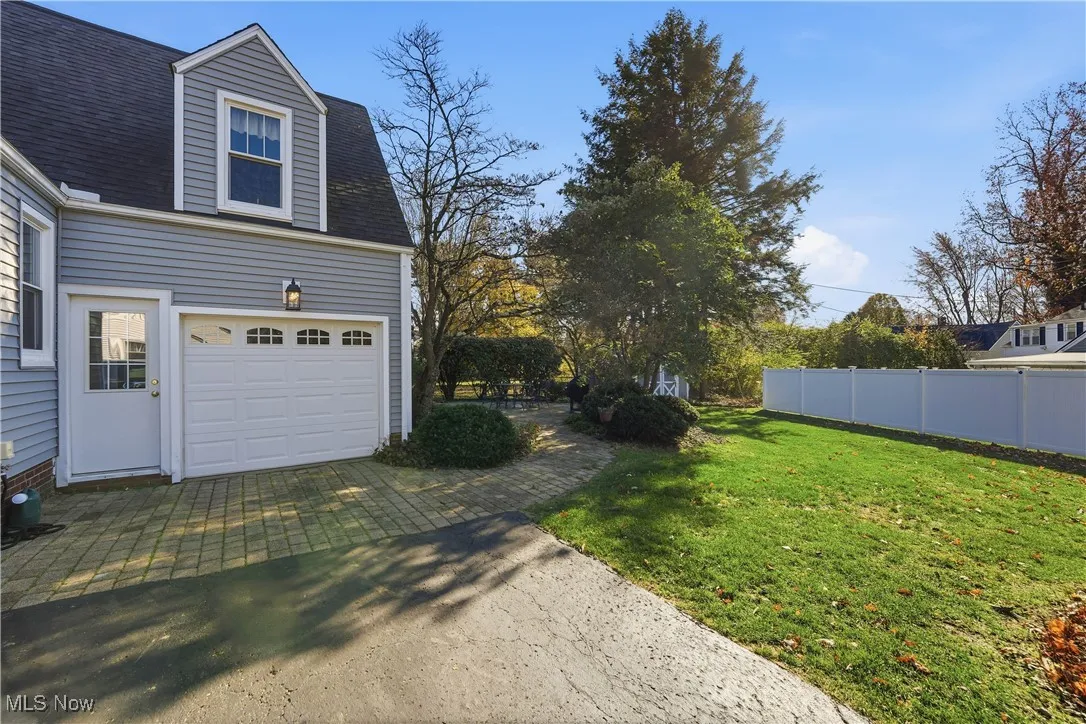View of yard with a garage