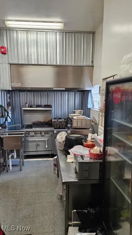 Kitchen with stainless steel stove