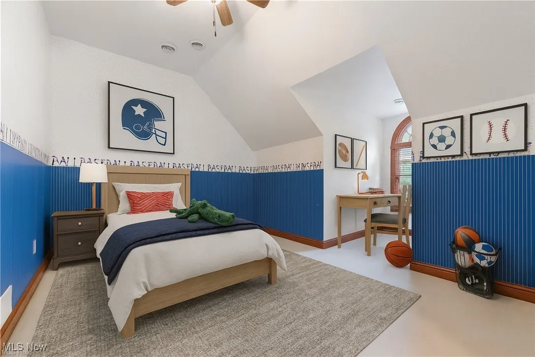 This bright and roomy second-floor bedroom offers plenty of space to relax, complete with a large closet — virtually staged