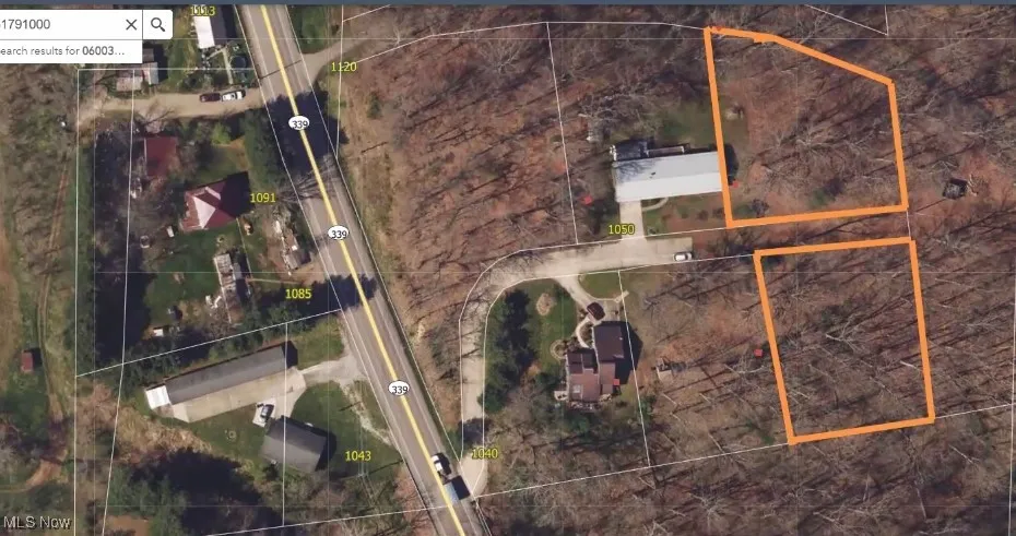 Aerial view of property's location featuring property parcel outlined