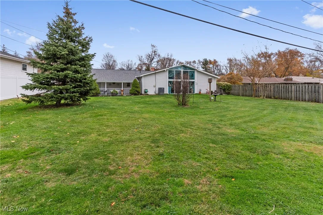 View of fenced backyard