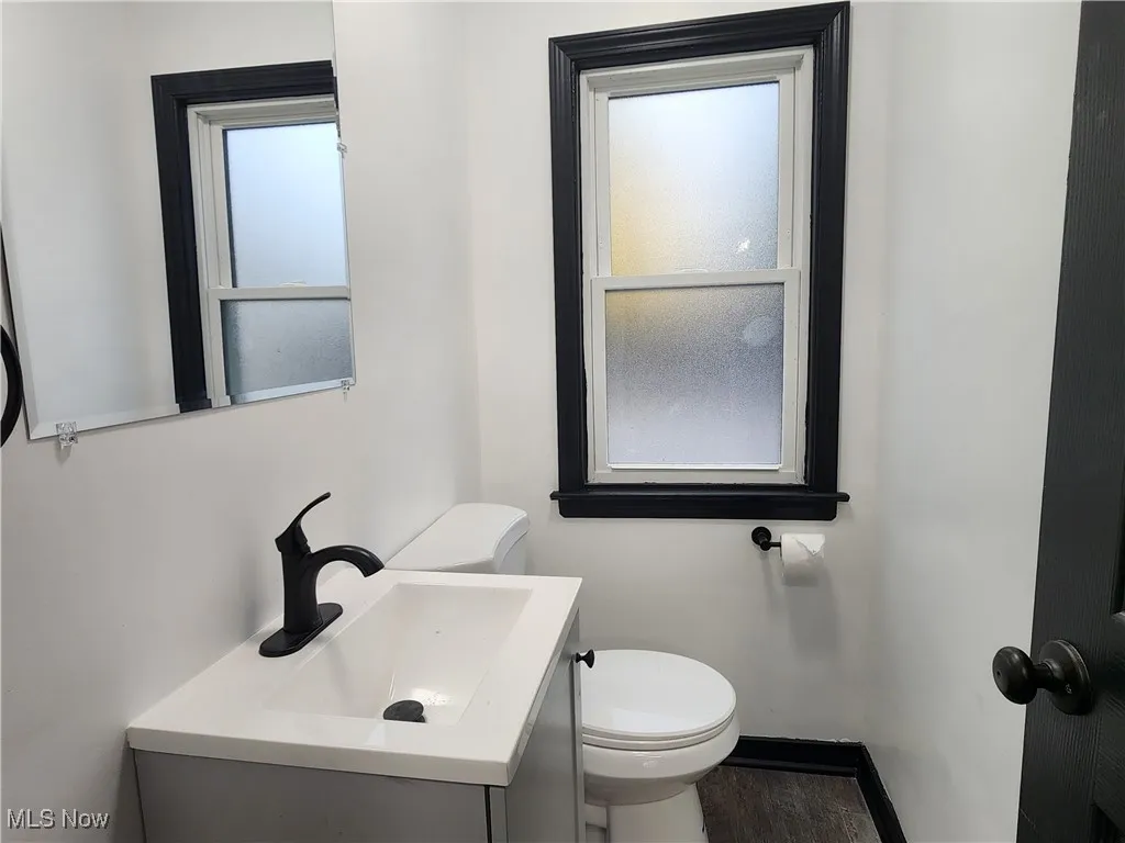Half bath with toilet and vanity