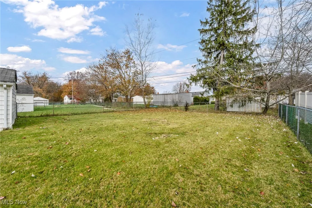 View of fenced backyard