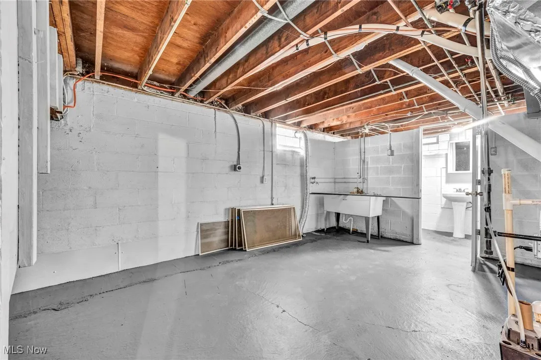 Below grade area with a sink