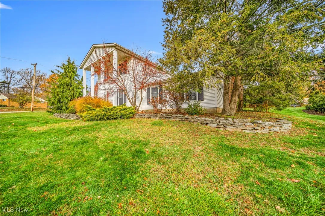 View of front of house featuring a front yard