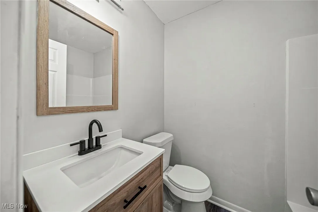 Bathroom with vanity and toilet