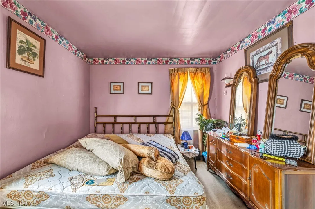 Bedroom featuring carpet floors