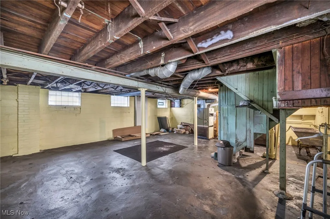 Below grade area featuring heating unit