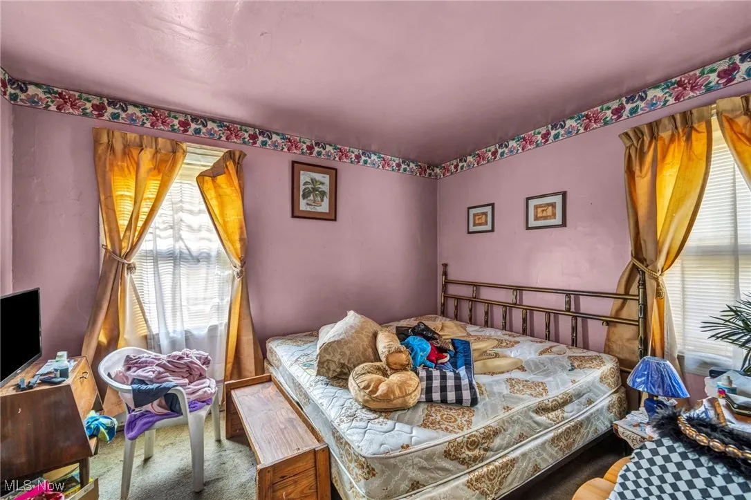 Bedroom featuring carpet