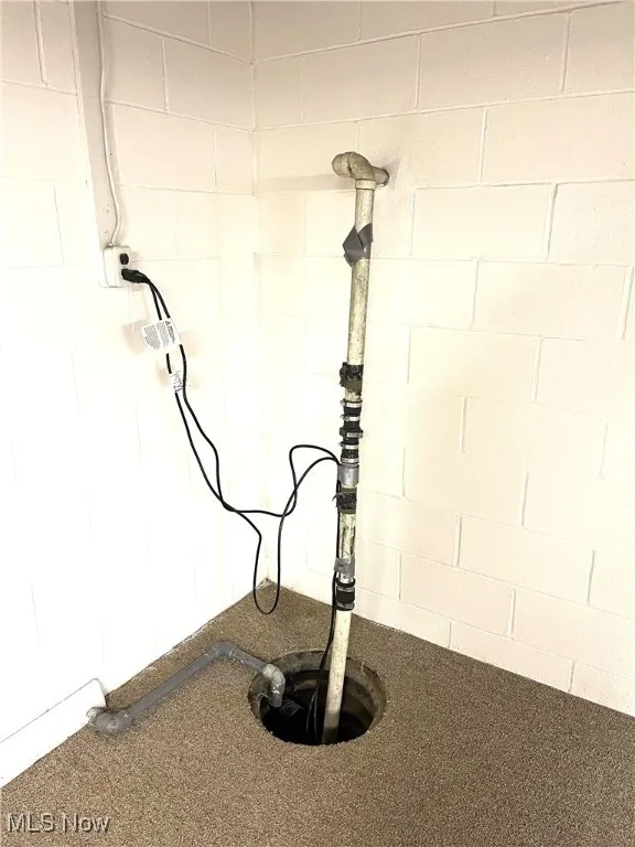 Detailed view of concrete block wall and drainage system