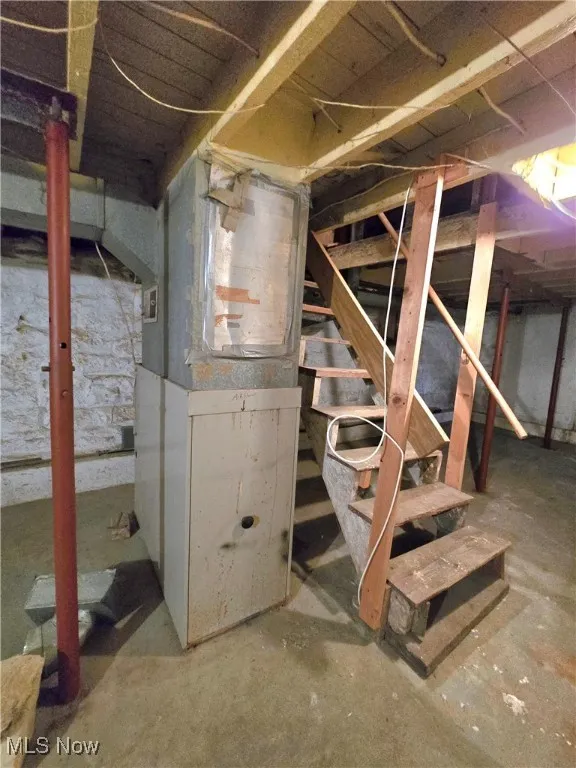 Unfinished basement with heating unit