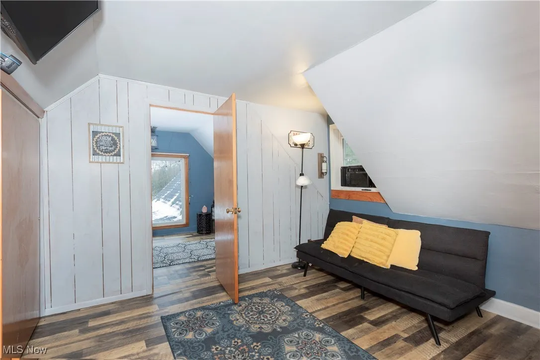 Bedroom with a second room attached. The two could make a great primary bedroom with generous closet space and sitting area, or possible nursery or office. Vinyl plank flooring.