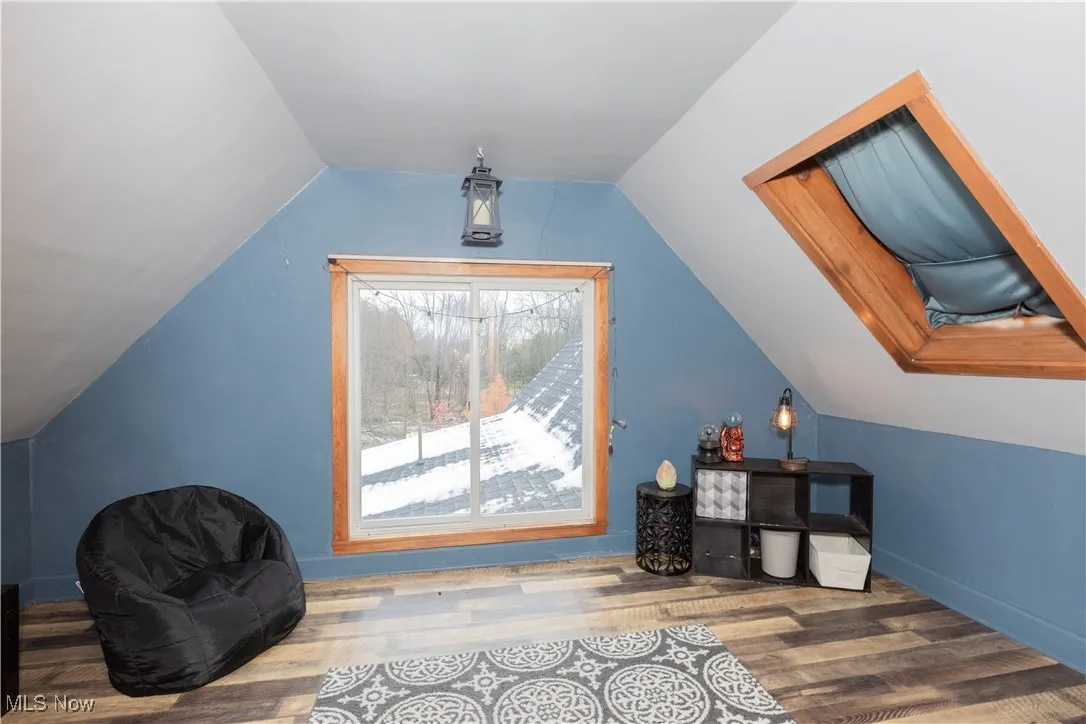 The second bedroom connected to previous.  Currently used as a bonus play area. Vinyl plank flooring.