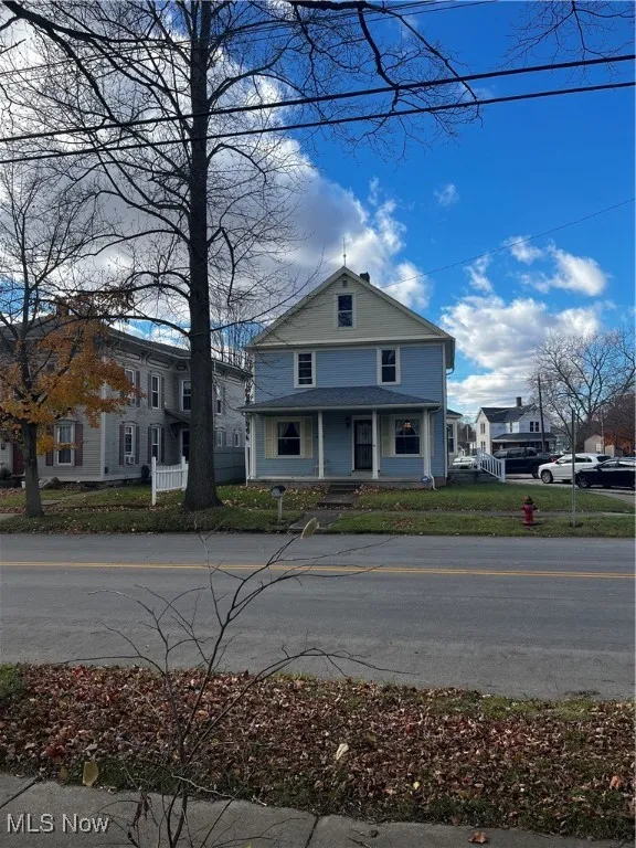 Traditional style home with covered porch