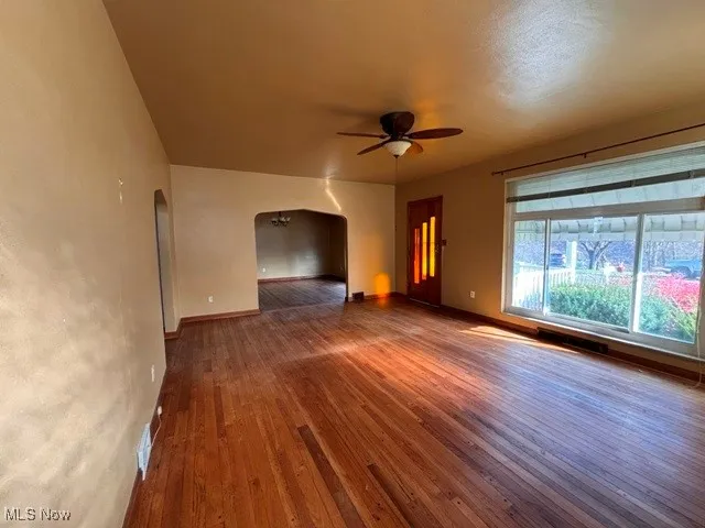 Large living room w/nice hardwood & huge picture window