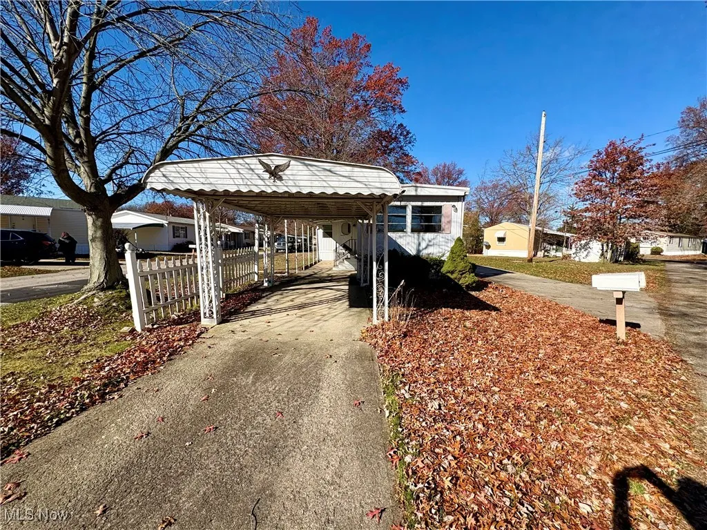 Bungalow-style house featuring driveway