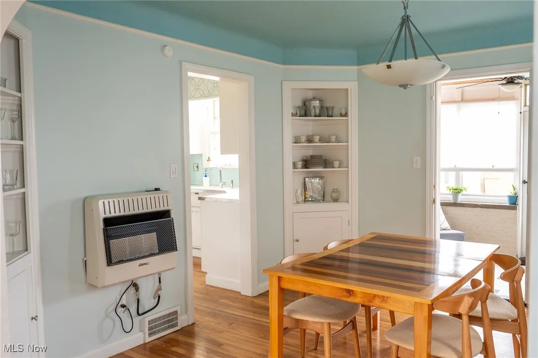 Dining room with wall heater