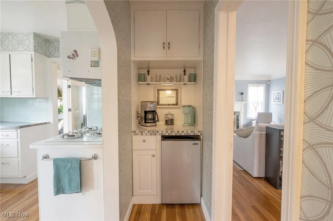 Possibly this was where refrigerator used to be, now shelf and cabinets