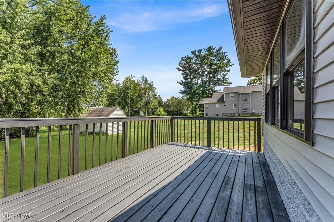 Wooden deck with a lawn