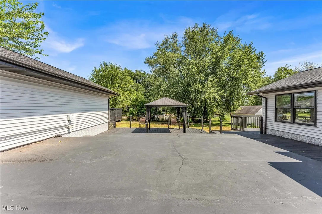 View of patio / terrace featuring a gazebo and a deck