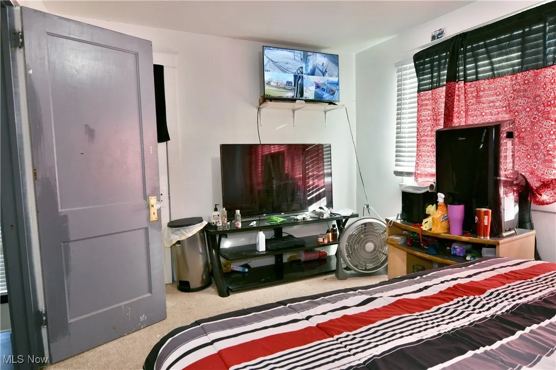 Bedroom featuring carpet