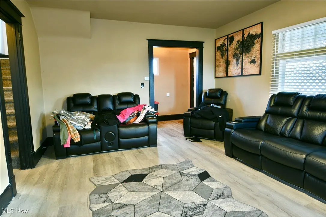 Living room with healthy amount of natural light and wood finished floors