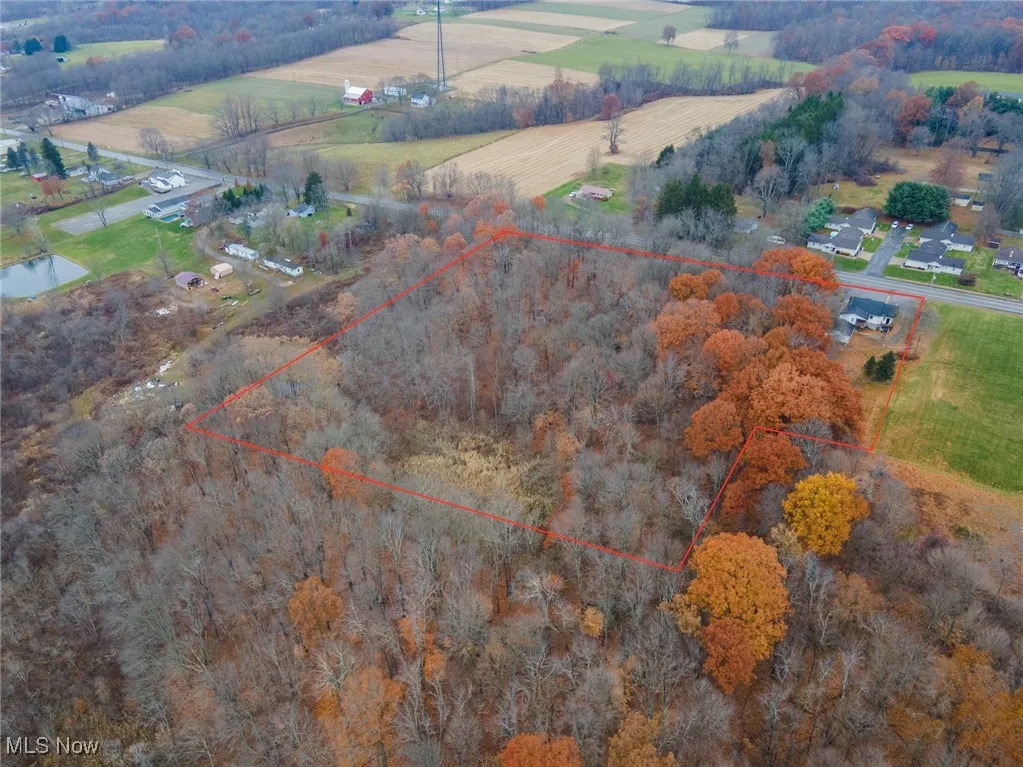 Overview of rural landscape with property parcel outlined