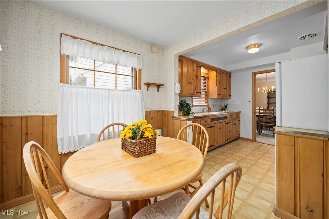  Two large windows make the kitchen a cheerful space.