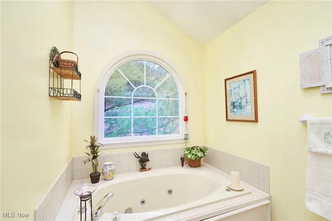 Full bath with a whirlpool tub