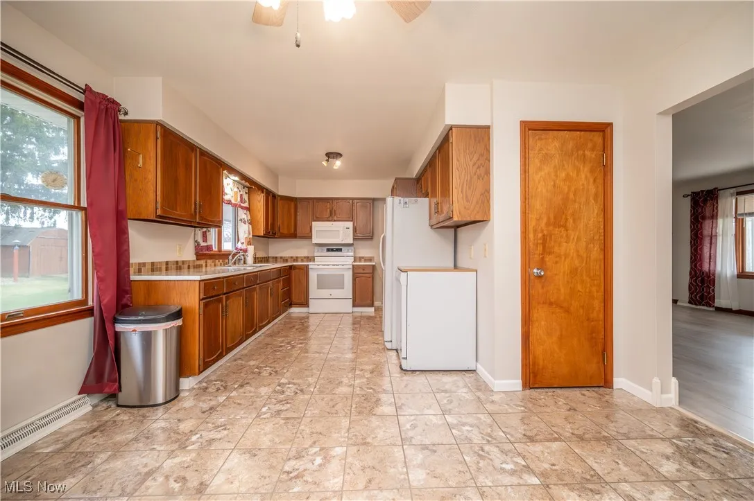 Kitchen with cabinets and appliances