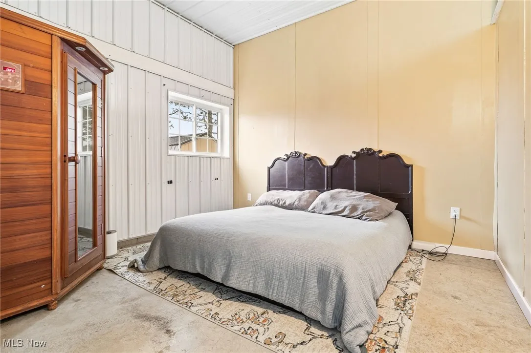 Bedroom with baseboards