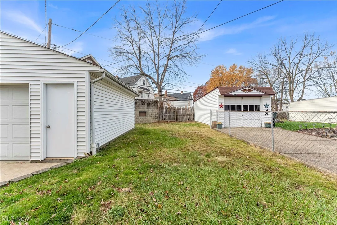 View of yard with an outbuilding
