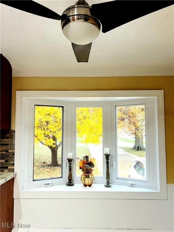 Casual dining area offers wonderful views out your bay window- Newer Windows throughout lets natural sunlight stream through