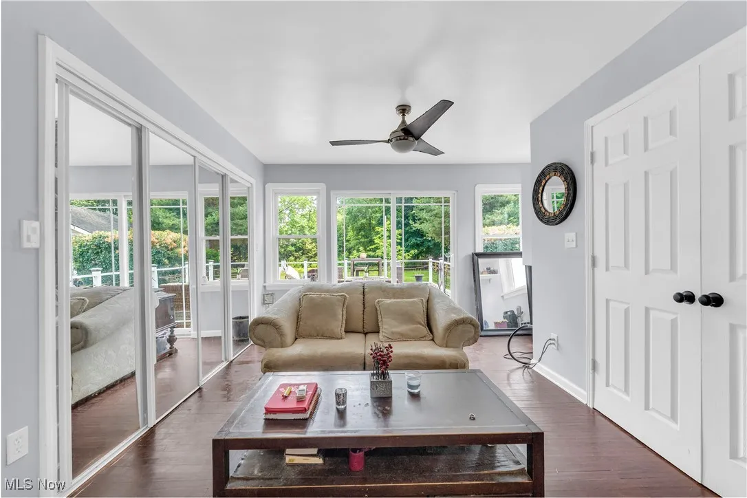 Enjoy you own private sitting area located in primary bedroom space.  Wall of windows streams in light with gorgeous views of your back yard - TWO large closets with Organizers