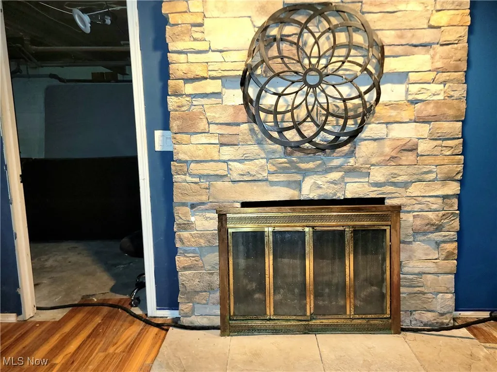 Partial finished basement with beautiful Stone fireplace
