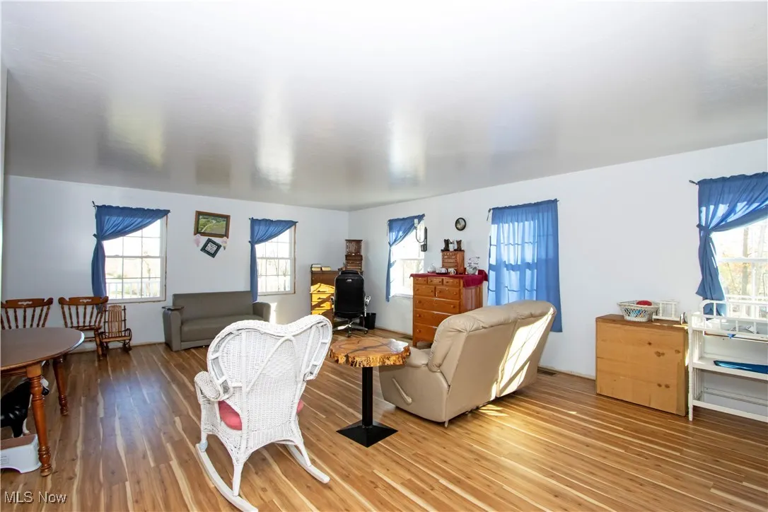 Living room featuring wood finished floors