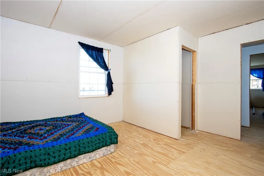 Bedroom with light wood-type flooring