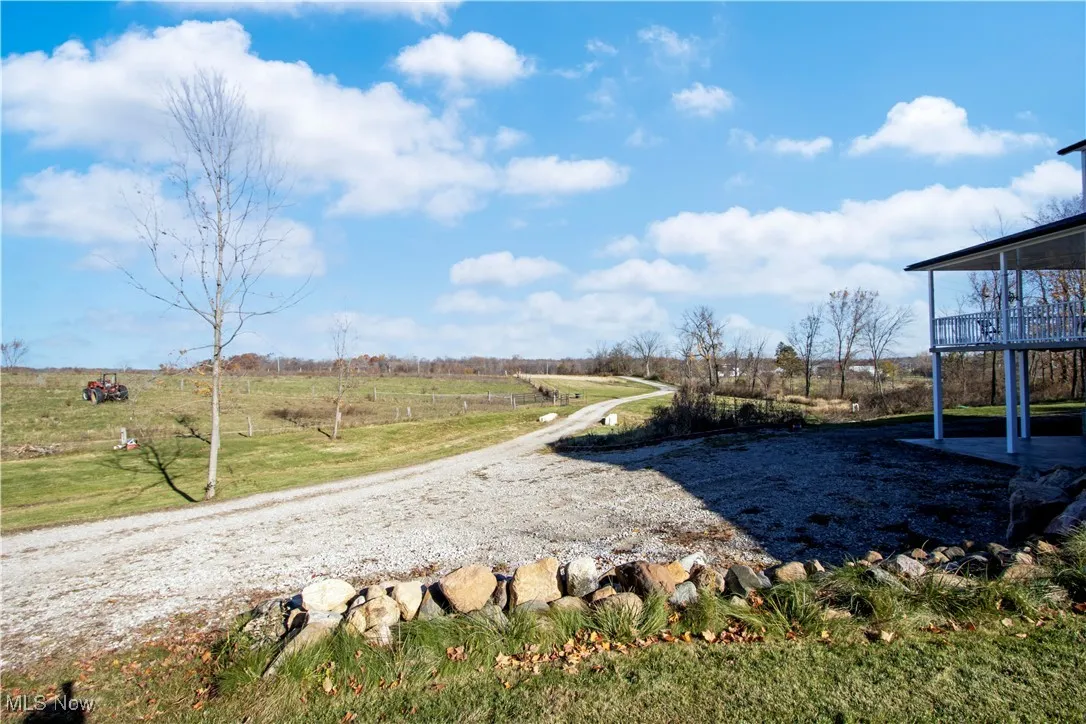 View of green lawn featuring a view of countryside