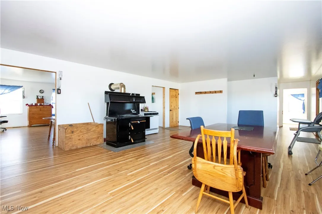Dining area featuring light wood finished floors