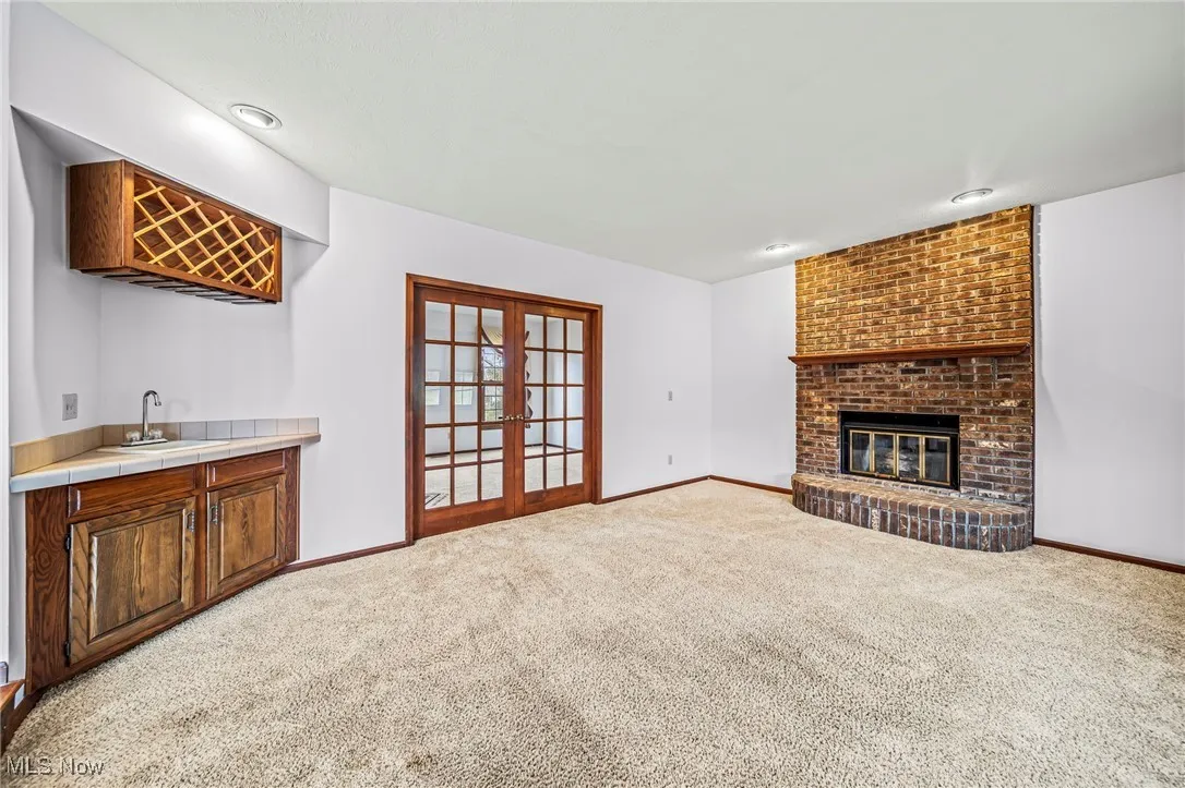 Family room with fireplace and wet bar