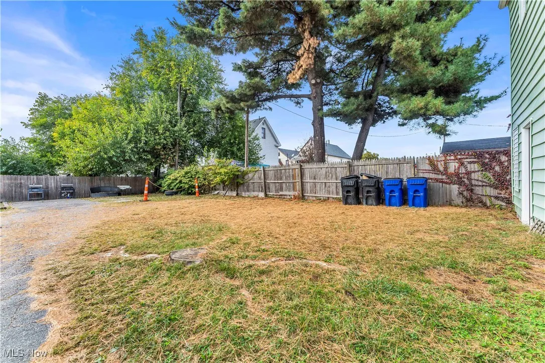 View of fenced backyard