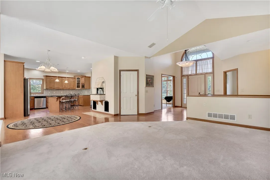 View from living room to entry and kitchen
