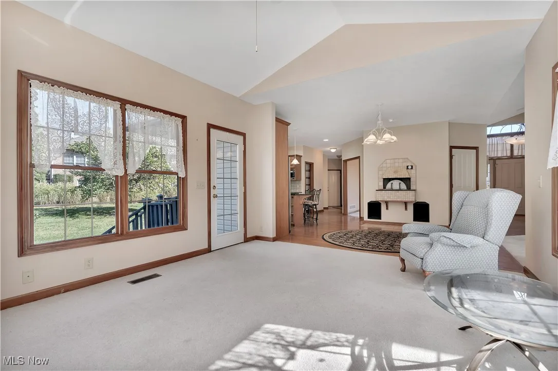 Sunroom adjacent to eat in kitchen area
