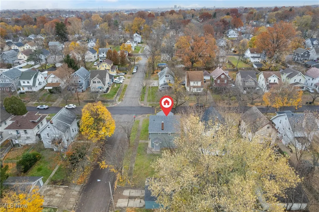 Aerial overview of property's location with nearby suburban area
